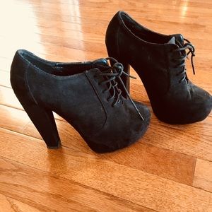 Black lace up heeled boots